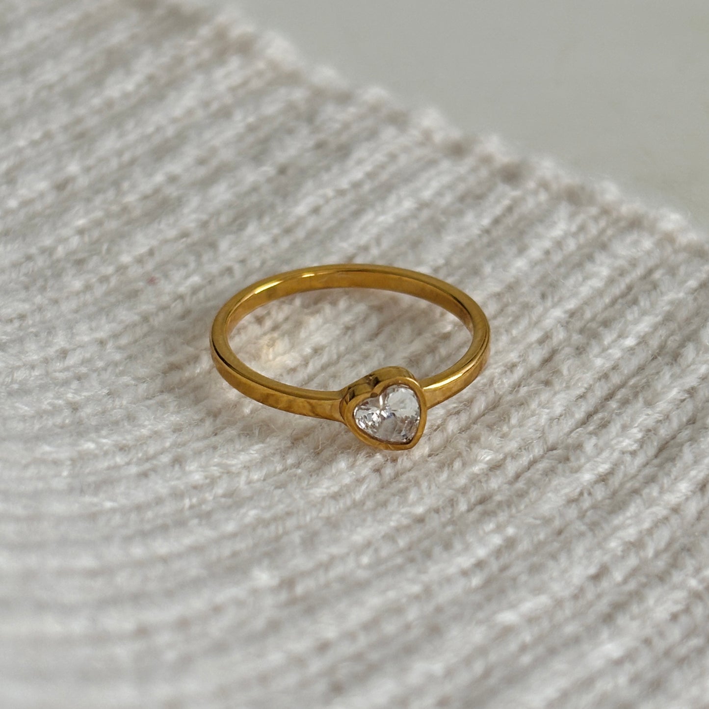 Tilted heart ring
