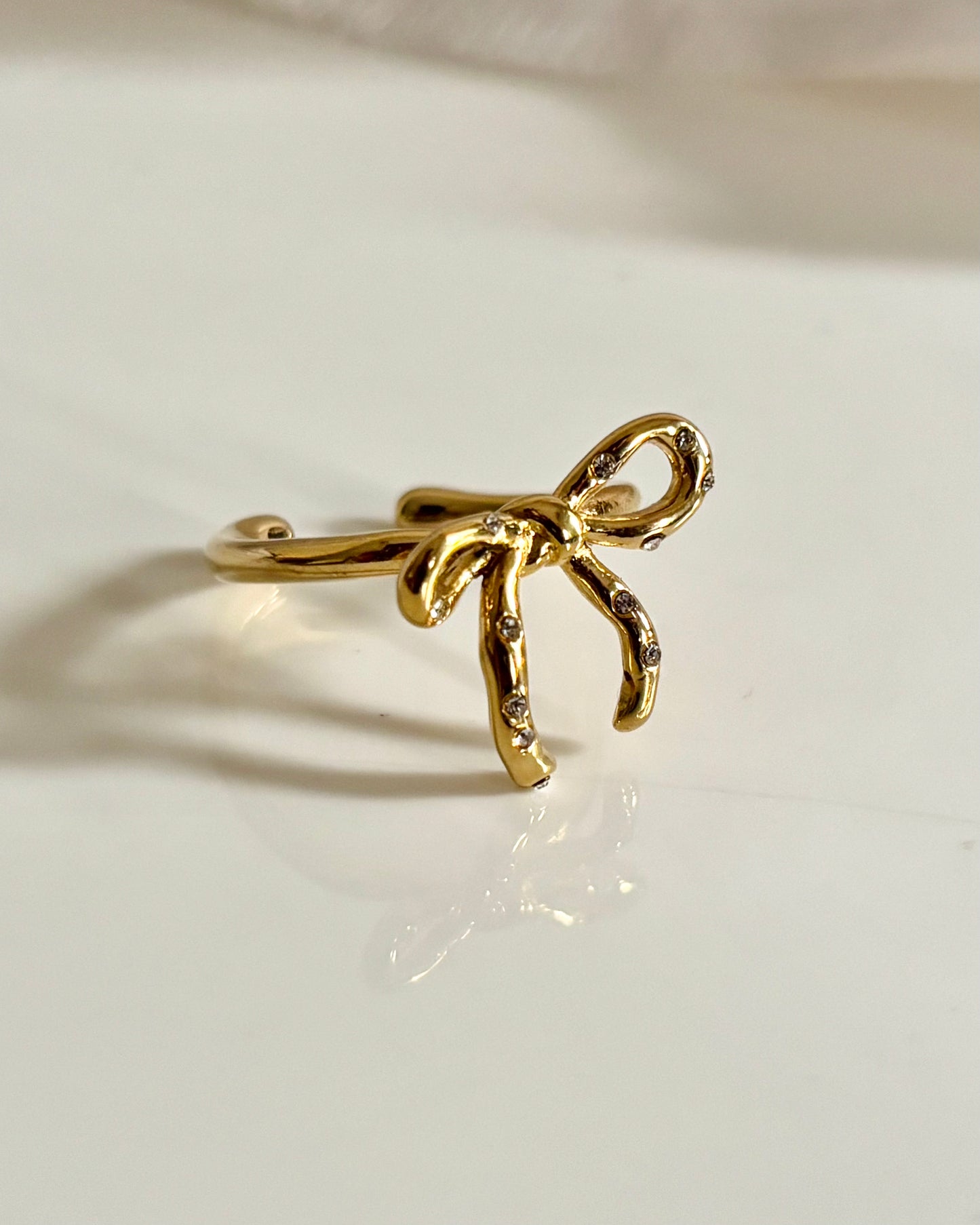 Bow ring - stone studded